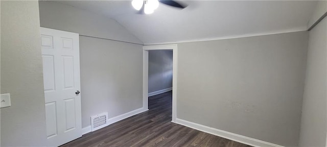 5118 Wabash Ave, Kansas City, MO 64130 - spare room featuring baseboards, dark wood-style floors, ceiling fan, and vaulted ceiling