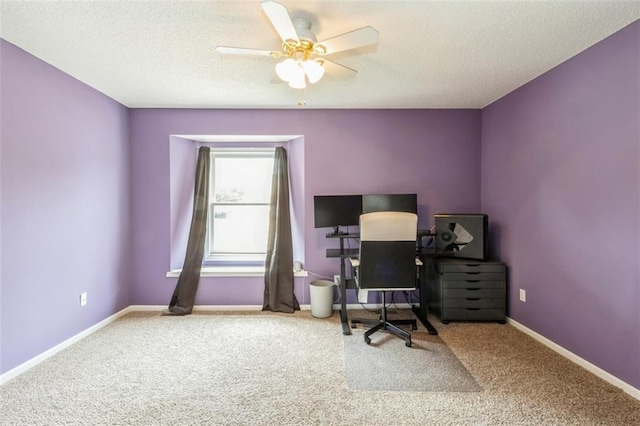 5309 NE Rainbow Cir, Lees Summit, MO 64064 - carpeted office featuring ceiling fan, baseboards, and a textured ceiling