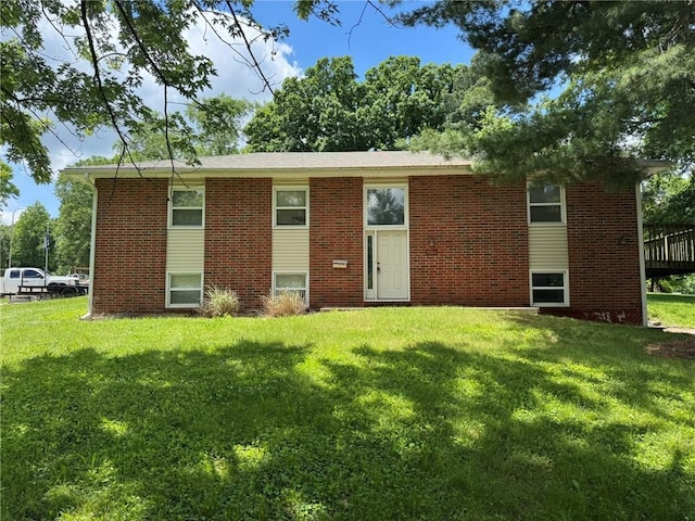 3006 S Santa Fe Rd, Independence, MO 64055 - raised ranch with a front lawn and brick siding