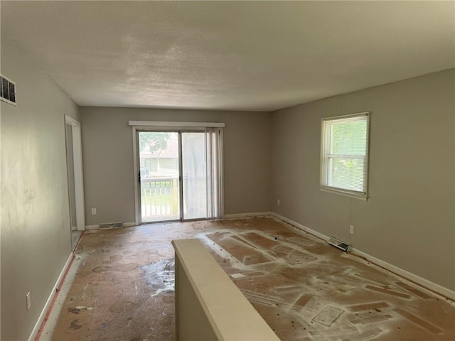 3006 S Santa Fe Rd, Independence, MO 64055 - spare room with plenty of natural light and baseboards