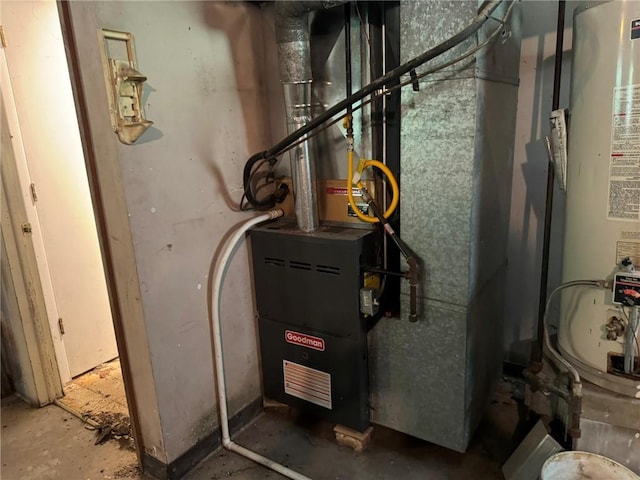 3006 S Santa Fe Rd, Independence, MO 64055 - utility room featuring gas water heater