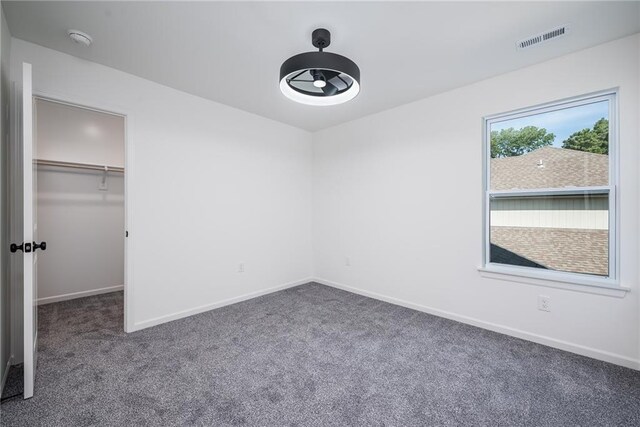 11147 Rowland Ave, Kansas City, KS 66109 - unfurnished bedroom featuring carpet flooring and baseboards