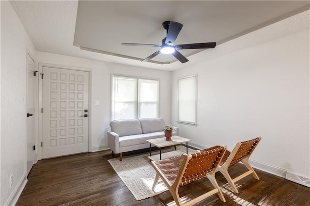 1617 N Pearl St, Independence, MO 64050 - living room featuring ceiling fan and wood finished floors