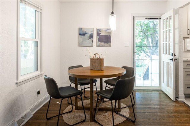 1617 N Pearl St, Independence, MO 64050 - dining space with dark wood-style floors