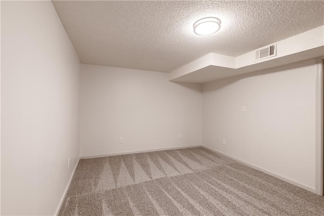 1617 N Pearl St, Independence, MO 64050 - additional living space featuring carpet flooring and a textured ceiling