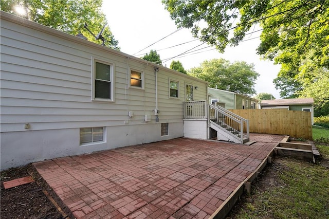 1617 N Pearl St, Independence, MO 64050 - back of property with a patio area