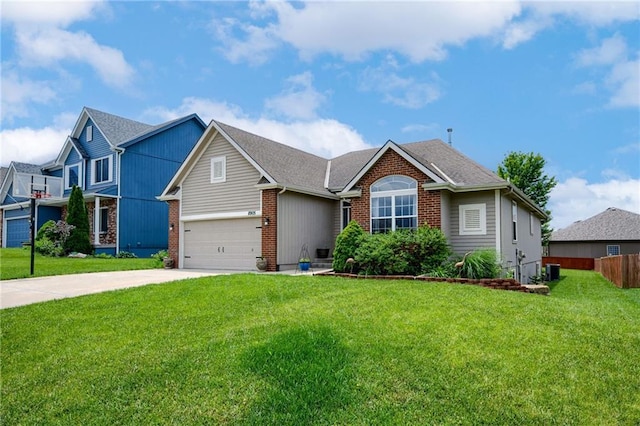 8905 NE 101st St, Kansas City, MO 64157 - view of front facade with driveway, a garage, brick siding, central AC, and roof with shingles