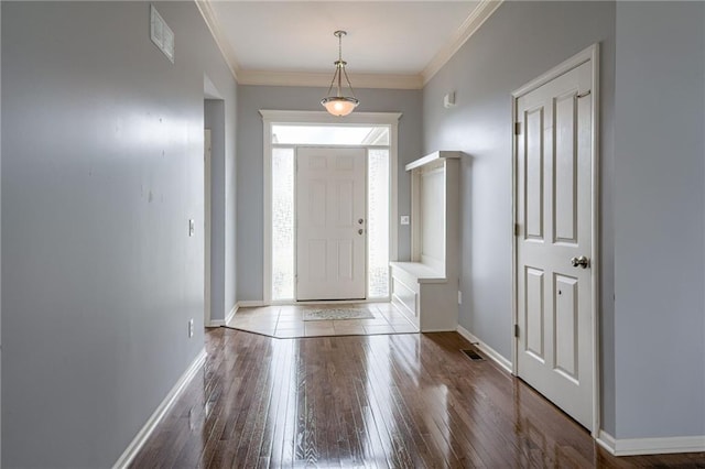 8905 NE 101st St, Kansas City, MO 64157 - foyer with hardwood / wood-style flooring, baseboards, and crown molding