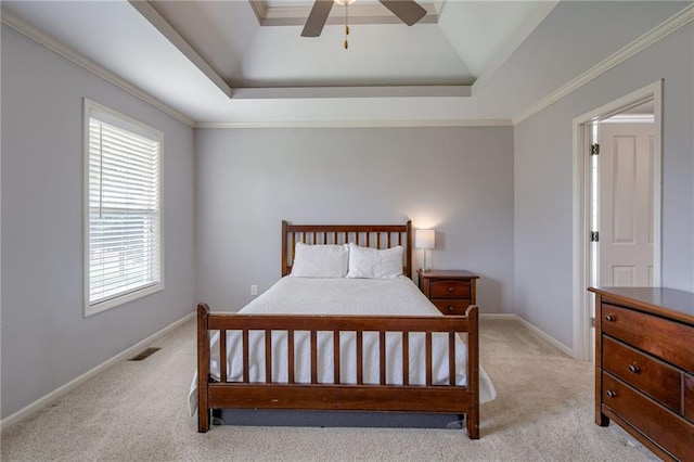 8905 NE 101st St, Kansas City, MO 64157 - bedroom featuring light carpet, multiple windows, and a raised ceiling