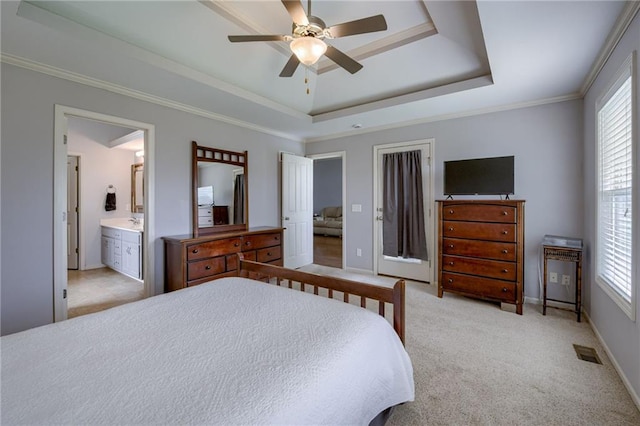 8905 NE 101st St, Kansas City, MO 64157 - bedroom featuring multiple windows, a tray ceiling, baseboards, and crown molding