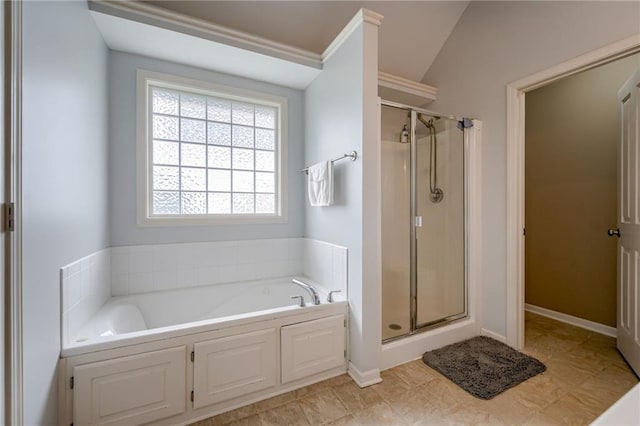 8905 NE 101st St, Kansas City, MO 64157 - bathroom featuring a shower stall, a garden tub, and vaulted ceiling