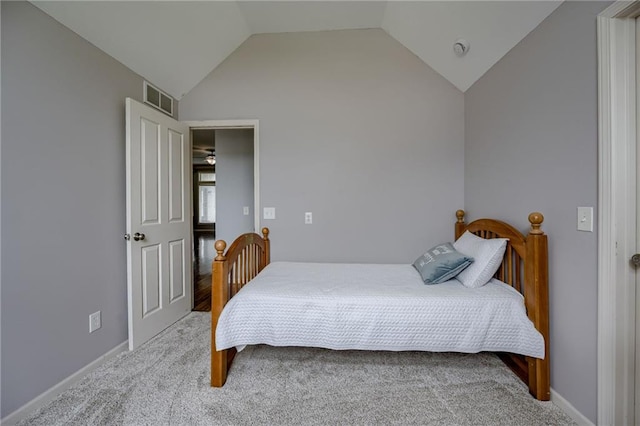 8905 NE 101st St, Kansas City, MO 64157 - carpeted bedroom featuring lofted ceiling and baseboards