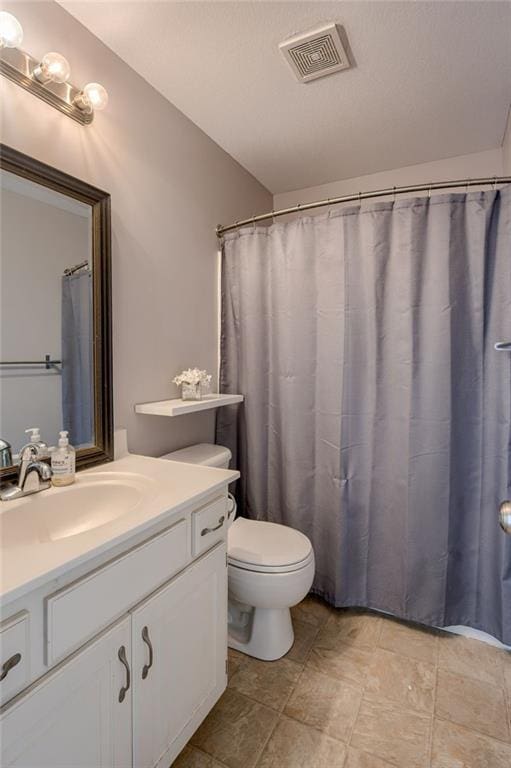 8905 NE 101st St, Kansas City, MO 64157 - bathroom featuring vanity and toilet