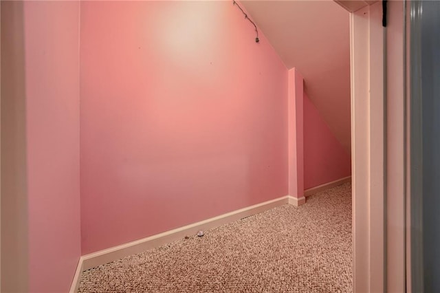 8905 NE 101st St, Kansas City, MO 64157 - hallway with carpet flooring, baseboards, and lofted ceiling