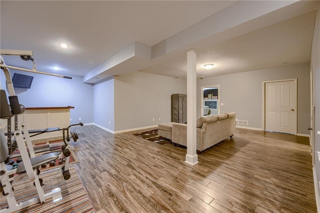 8905 NE 101st St, Kansas City, MO 64157 - exercise room with wood finished floors, baseboards, and recessed lighting