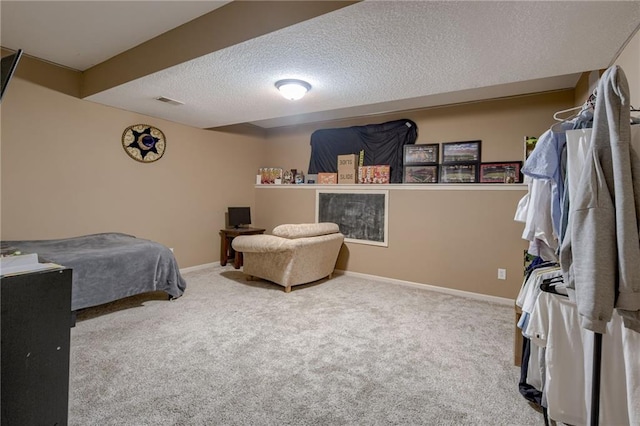 8905 NE 101st St, Kansas City, MO 64157 - bedroom with a textured ceiling, carpet flooring, baseboards, and a desk