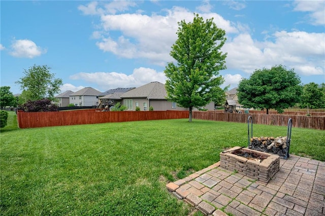 8905 NE 101st St, Kansas City, MO 64157 - view of yard featuring an outdoor fire pit, a residential view, and a patio