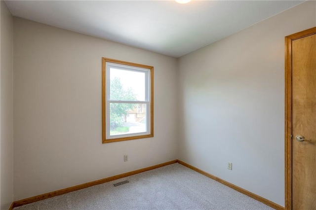 833 SW Harvest Dr, Grain Valley, MO 64029 - carpeted spare room with baseboards