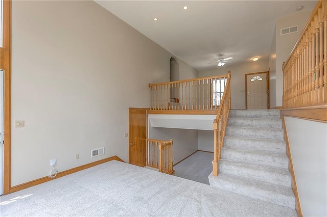 833 SW Harvest Dr, Grain Valley, MO 64029 - stairs featuring carpet, a ceiling fan, recessed lighting, and baseboards
