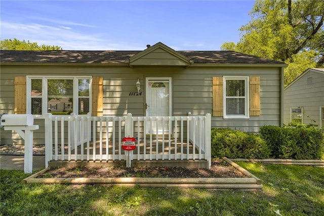 11124 W 69th Ter, Shawnee, KS 66203 - view of bungalow-style house