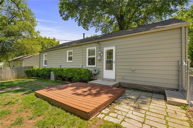 11124 W 69th Ter, Shawnee, KS 66203 - back of property featuring a wooden deck