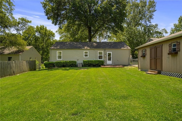 11124 W 69th Ter, Shawnee, KS 66203 - rear view of property with an outbuilding