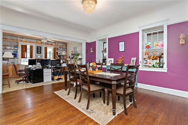 424 S Elm St, Ottawa, KS 66067 - dining area featuring wood finished floors, an office area, baseboards, and ceiling fan