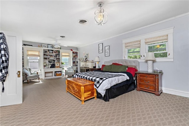 424 S Elm St, Ottawa, KS 66067 - bedroom with crown molding, carpet flooring, and baseboards