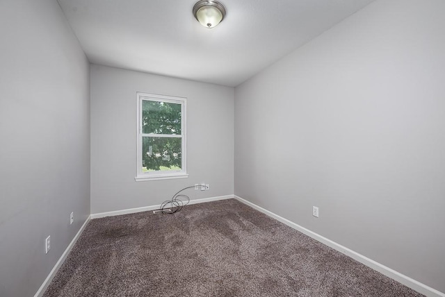 1180 Greenwood Pkwy, Tonganoxie, KS 66086 - carpeted empty room featuring baseboards