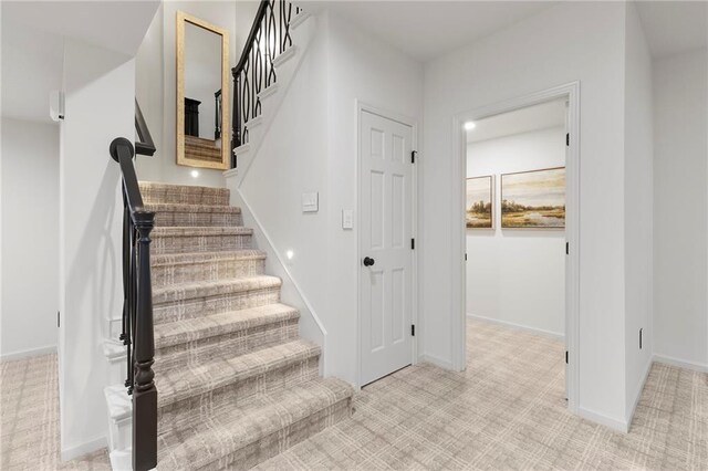 4424 NE Shadow Valley Cir, Lees Summit, MO 64064 - stairs featuring carpet flooring and baseboards
