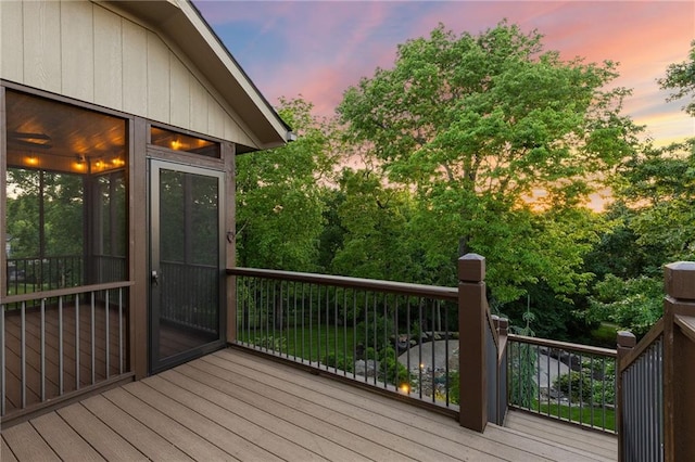 4424 NE Shadow Valley Cir, Lees Summit, MO 64064 - deck at dusk with a sunroom