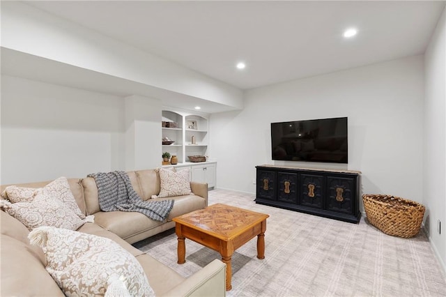 4424 NE Shadow Valley Cir, Lees Summit, MO 64064 - living area featuring light colored carpet, recessed lighting, baseboards, and built in features