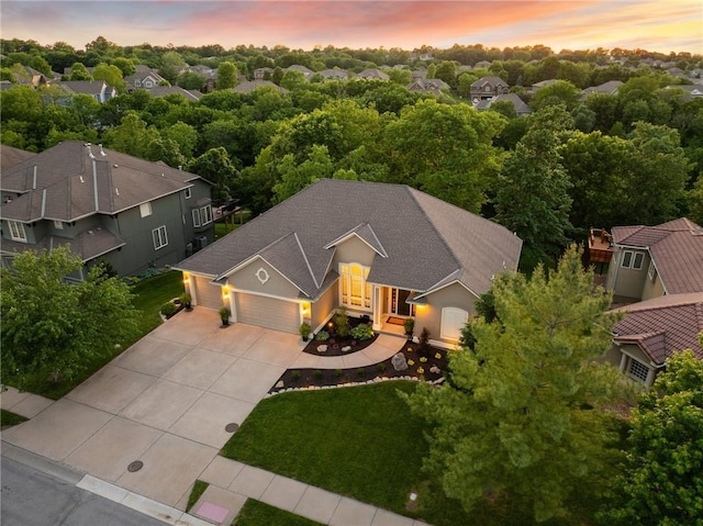 4424 NE Shadow Valley Cir, Lees Summit, MO 64064 - aerial view at dusk of a residential view