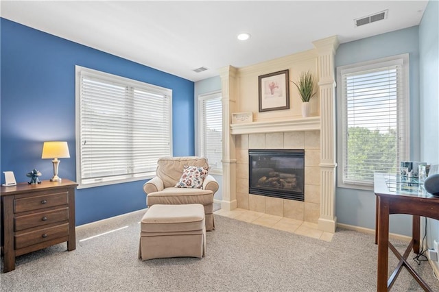 13897 W 140th St, Olathe, KS 66062 - sitting room with carpet floors, a tile fireplace, baseboards, and recessed lighting