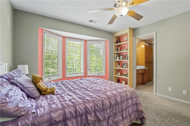 13897 W 140th St, Olathe, KS 66062 - bedroom featuring light carpet, baseboards, ceiling fan, and ensuite bathroom
