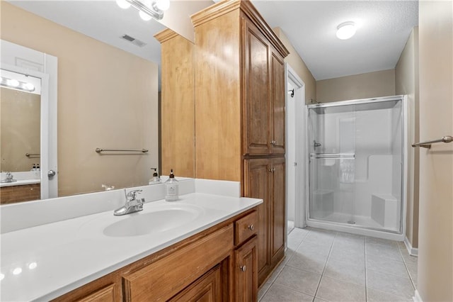13897 W 140th St, Olathe, KS 66062 - full bathroom with vanity, a stall shower, tile patterned floors, and baseboards