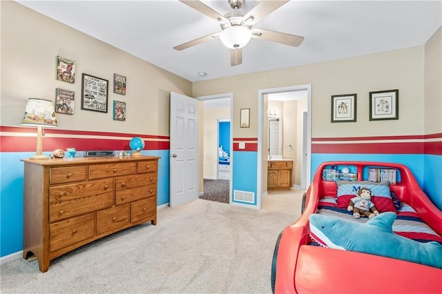 13897 W 140th St, Olathe, KS 66062 - carpeted bedroom with ensuite bathroom, baseboards, and a ceiling fan