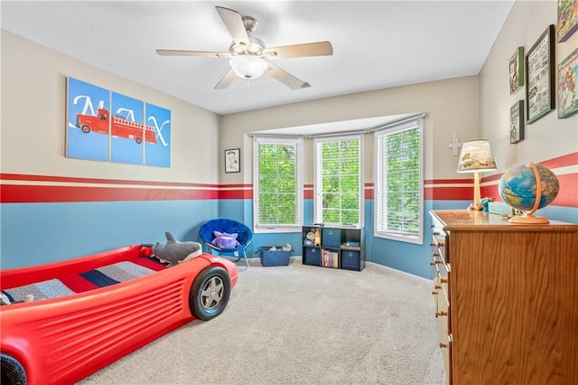 13897 W 140th St, Olathe, KS 66062 - carpeted bedroom with ceiling fan and baseboards