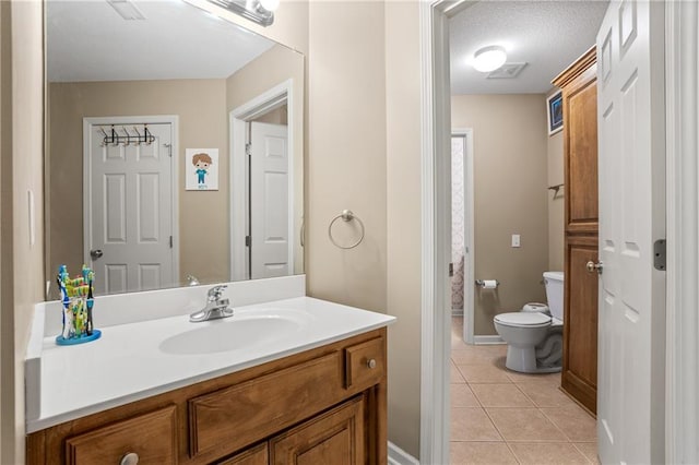 13897 W 140th St, Olathe, KS 66062 - full bath with vanity, tile patterned floors, toilet, and baseboards