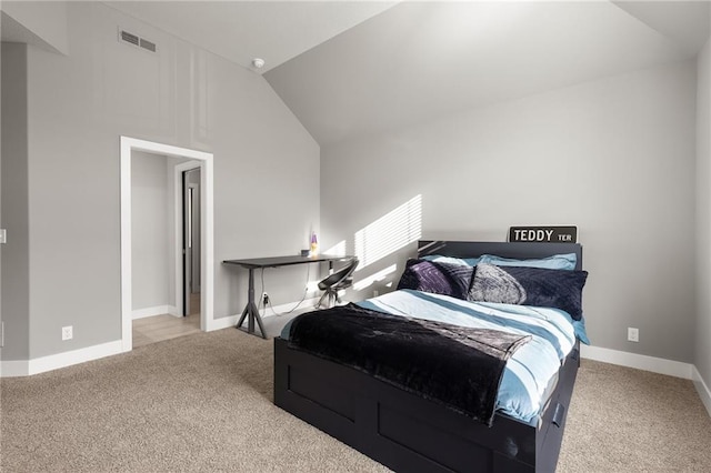5947 N Cosby St, Kansas City, MO 64151 - bedroom with carpet, vaulted ceiling, and baseboards
