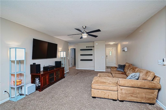 1604 S 105th Ter, Edwardsville, KS 66111 - carpeted living area featuring baseboards, a ceiling fan, and a textured ceiling