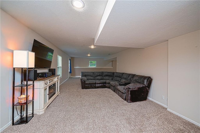 1604 S 105th Ter, Edwardsville, KS 66111 - living area with a textured ceiling, light colored carpet, baseboards, and recessed lighting