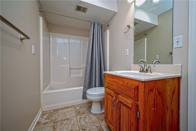 1604 S 105th Ter, Edwardsville, KS 66111 - full bathroom with toilet, vanity, baseboards, shower / tub combo, and stone finish floors