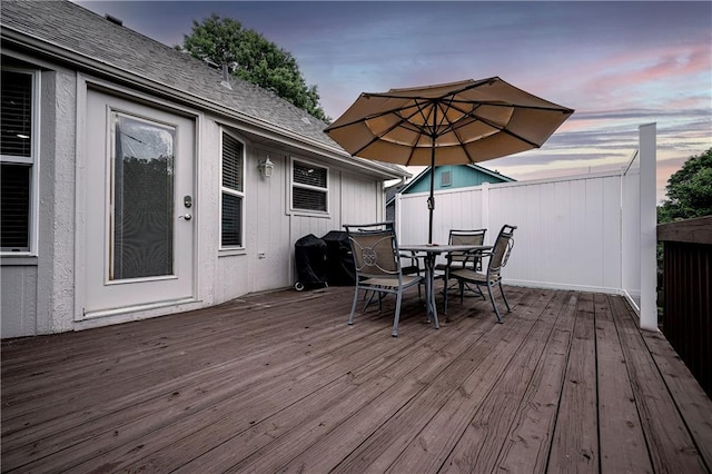 1604 S 105th Ter, Edwardsville, KS 66111 - deck at dusk with outdoor dining space