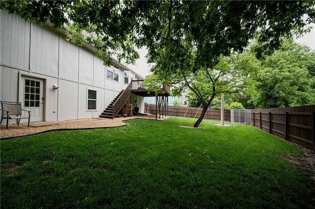 1604 S 105th Ter, Edwardsville, KS 66111 - view of yard with stairway and a wooden deck