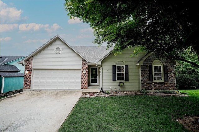 1604 S 105th Ter, Edwardsville, KS 66111 - ranch-style home featuring brick siding, concrete driveway, a garage, and a front yard