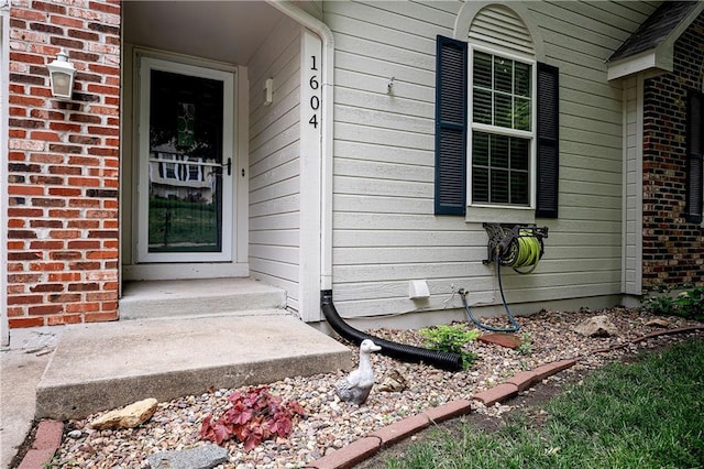 1604 S 105th Ter, Edwardsville, KS 66111 - doorway to property with brick siding