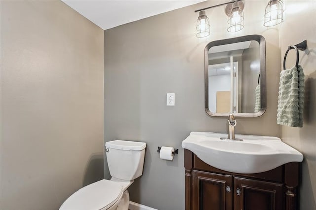 19708 E 11th Ter N, Independence, MO 64056 - bathroom with vanity, toilet, and baseboards