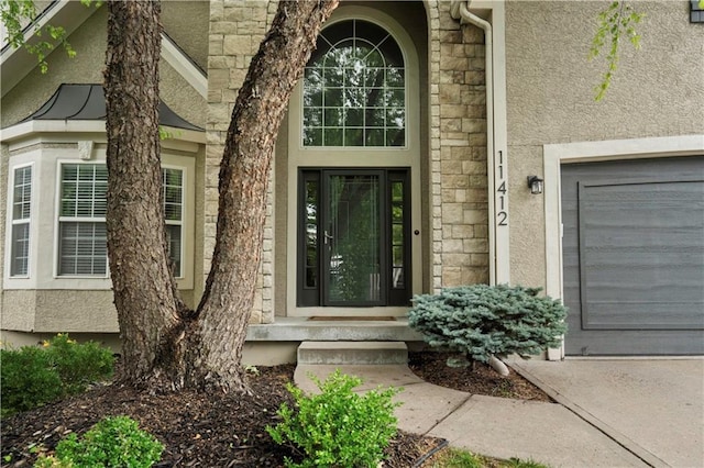 11412 S Lakecrest Dr, Olathe, KS 66061 - property entrance with stucco siding and stone siding