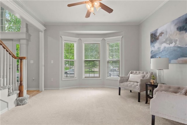 11412 S Lakecrest Dr, Olathe, KS 66061 - sitting room featuring stairway, carpet floors, crown molding, ceiling fan, and baseboards